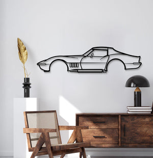 A garage wall styled with 1969 Chevrolet Corvette silhouette décor evokes classic muscle car heritage