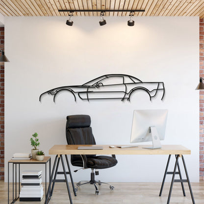 Celebrate raw performance with a metal tribute to the 2002 Chevrolet Corvette C5 Z06 silhouette
