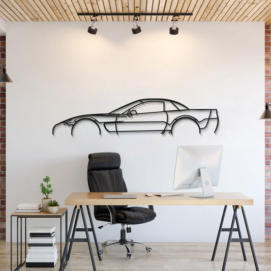Celebrate raw performance with a metal tribute to the 2002 Chevrolet Corvette C5 Z06 silhouette