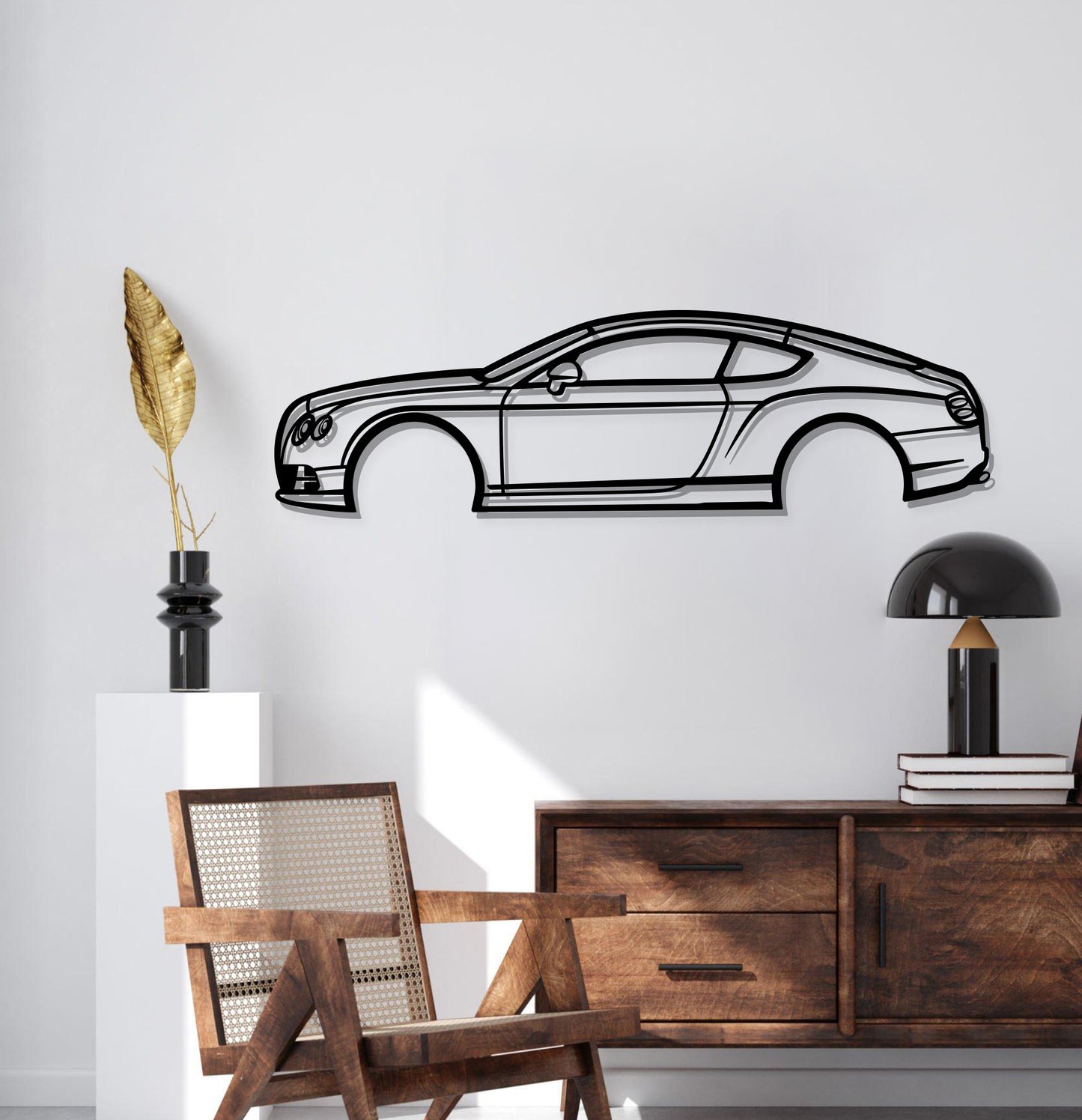 Garage wall styled with Bentley Continental silhouette décor evokes refined British automotive heritage