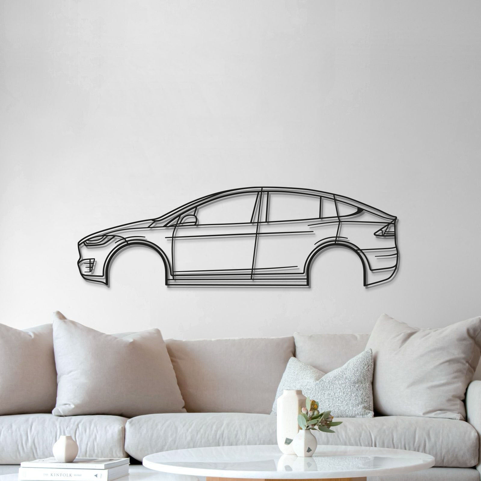 5. Durable 2020 Model X Performance metal wall plaque in textured matte steel, elevated 1 cm to add striking depth and dimension.
