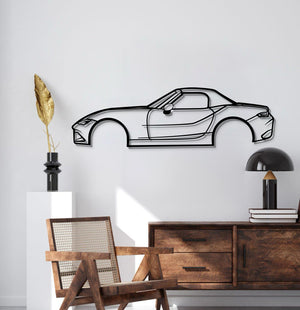 Garage wall styled with 2021 Mazda Miata MX‑5 laser-cut metal silhouette