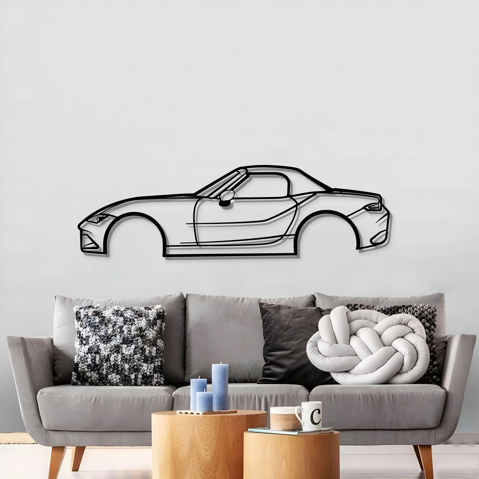 Office décor featuring 2021 Mazda Miata MX‑5 floating metal car sculpture