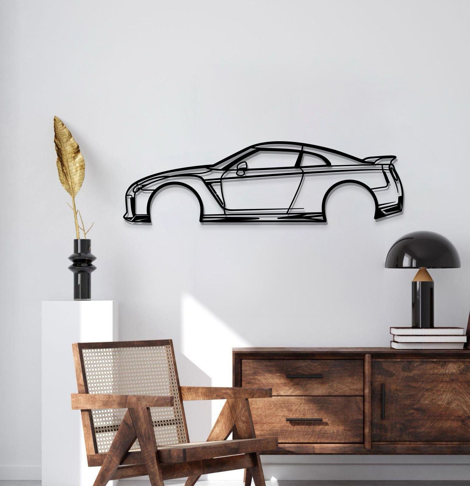 Nissan GTR R35 metal silhouette hangs elegantly in a sleek garage setup