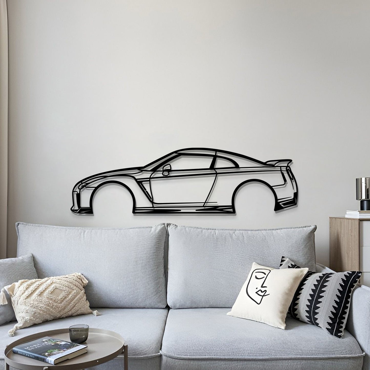 Nissan GTR R35 metal car sculpture displayed above a workstation for automotive flair