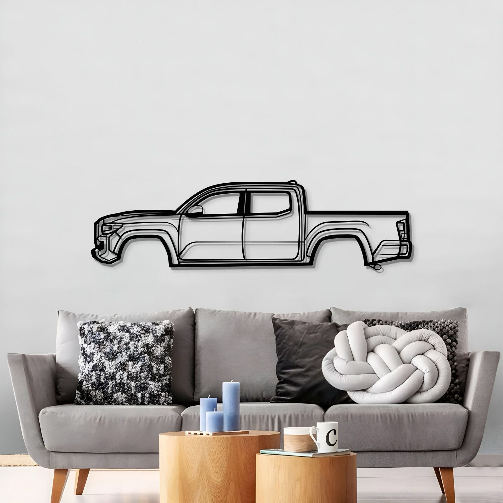 Laser-cut 2022 Tacoma metal wall sculpture in textured matte steel, perfect for garage or office.
