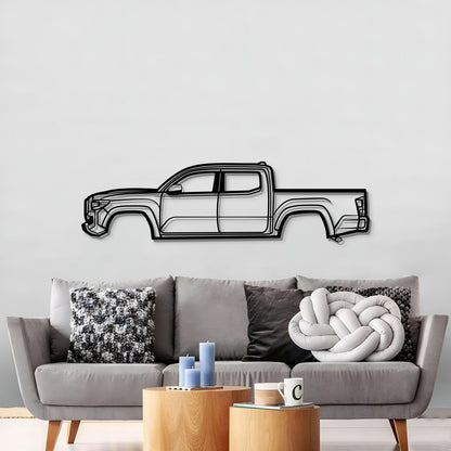 Laser-cut 2022 Tacoma metal wall sculpture in textured matte steel, perfect for garage or office.