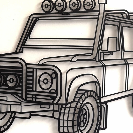Retro‑modern Defender 110 perspective metal wall decor for office or showroom