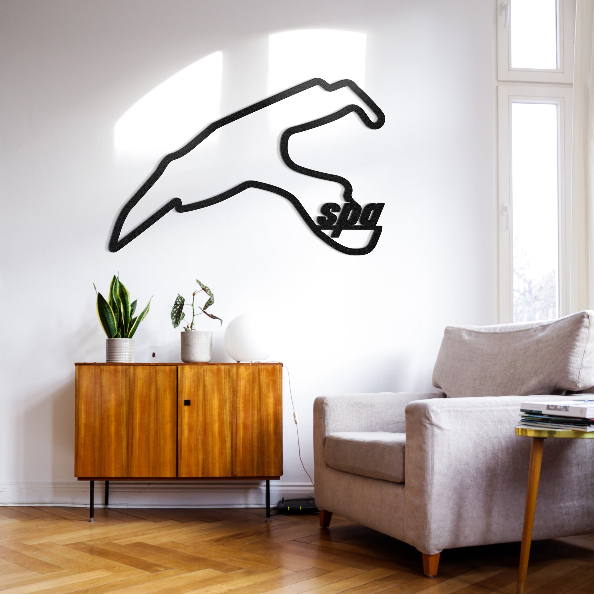 Automotive metal wall art with Spa Formula 1 circuit enriching bedroom décor